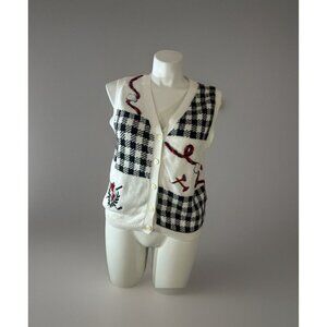 First tee Women’s size large Sleeveless sweater vest White with black Golf theme